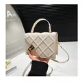 Quilted cream crossbody square bag with gold chain buckle and adjustable shoulder strap - White