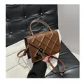 Elegant coffee brown quilted shoulder bag with gold metal clasp and chain strap detail - Brown