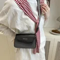Chic black leather and grey canvas crossbody bag for women with wide shoulder strap - Black