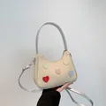 Borsa a spalla in tela beige con toppe a cuore colorate e finiture argento metallizzato - Argento