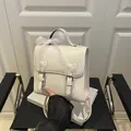 Creamy white PU leather backpack with elegant lace bow detail and buckle straps - White
