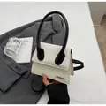 Chic beige and black square handbag for women with metallic logo and top handle - Off White