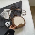 Retro round crossbody bag in brown and beige weave with a cute white cat pendant - With Charm / Brown