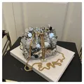 Silver sequin bucket bag with gold chain strap and pearl drawstring detail - Silver