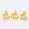Three vintage golden swan charms in zinc alloy for DIY jewelry making accessories - Gold