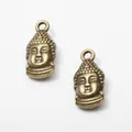 Colgantes de cabeza de Buda vintage en aleación de zinc bronceado para creación de joyas - Bronce Antiguo