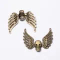 Vintage bronze skull with wings alloy pendant DIY jewelry findings shown from both sides - Antique Bronze