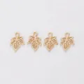 Set of four gold-plated maple leaf pendants with hollow details for DIY jewelry making - KC Gold