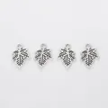 Set of four vintage zinc alloy maple leaf pendants with intricate veined textures - Antique Silver