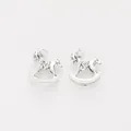 Vintage silver alloy rocking horse charms for DIY jewelry making on white background - Antique Silver