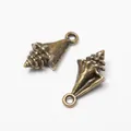 Set of two vintage bronze alloy conch shell charms for DIY jewelry making accessories - Antique Bronze