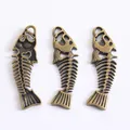 Three vintage bronze alloy fish bone charms for DIY jewelry making accessories - Antique Bronze