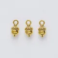 Three vintage gold acorn charms for DIY jewelry making with realistic scale textures - Antique Gold