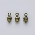 Three antique bronze acorn charms for DIY jewelry making with realistic grid texture details - Antique Bronze