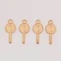 Close-up of four golden spiral lollipop charms made of vintage alloy for DIY jewelry - KC Gold