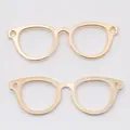 Macro shot of two gold glasses-shaped alloy charms with dual side hanging loops - 55*19mm / KC Gold