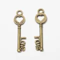 Vintage bronze heart key pendants featuring Love script for DIY jewelry making crafts - Antique Bronze