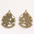 Pair of vintage bronze teardrop charms with intricate peacock design for jewelry making - Antique Bronze