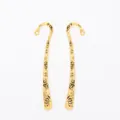 Detail showing two golden metal bookmarks with intricate black floral engraving and hooks - Antique Gold