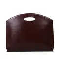 Pochette minimalista in pelle bordeaux scuro con manico traforato e finitura liscia - Marrone Scuro