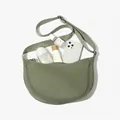 Lightweight avocado green nylon crossbody crescent bag showing large storage capacity - Olive Green