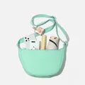 Mint green nylon crescent crossbody bag showing its spacious inner capacity for daily essentials - Mint Green