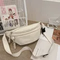 Beige corduroy crossbody chest bag with adjustable strap and striped velvet texture - White