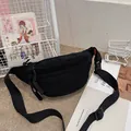 Chic black corduroy belt bag for women with adjustable strap and striped texture - Black