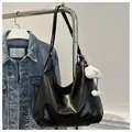 Chic black hobo tote bag in soft leather with a cute white cloud plush charm - With Pendant / Black