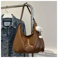 Brown retro hobo shoulder bag in soft leather with cute white cloud charm detail - With Pendant / Brown