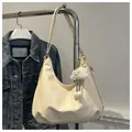 Chic beige hobo tote bag in synthetic leather with a fluffy cloud pendant and strap - With Pendant / White