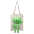 Cute off-white canvas tote bag featuring a 3D green plush cat doll and sturdy handles - White