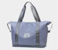 Sac de voyage bleu grande capacité avec compartiment à zip et poignées renforcées - Bleu