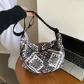 Ethnic knit crescent bag with colorful geometric patterns and adjustable black strap - Black / 23*26.5*8cm