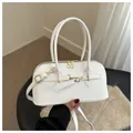 Structured white PU leather handbag with golden hardware and adjustable crossbody strap - White