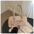 Beige faux leather Boston bag with double handles and gold-toned metal hardware details - Khaki