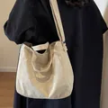 Große beige Cord-Einkaufstasche mit modischer Stickerei für Schule oder Pendeln - Braun