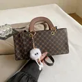 Retro brown geometric pattern square handbag with plush charm and top handle - With Pendant / Brown