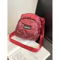 Burgundy glossy quilted crossbody bag in puffer style with metallic finish and logo - Burgundy