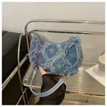 Blue denim crossbody bag with colorful stars, frayed edges, and silver chain strap - Colorful Star