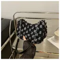 Chic black and white checkerboard denim crossbody bag with fringe edges and silver chain strap - Black Checkerboard