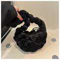 Fashionable black plush pleated handbag with bubble texture and minimalist aesthetic design - Black