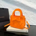 Borsa a mano minimalista arancione con fiocco in pelle PU liscia e tracolla fine - Arancione
