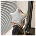 Chic silver star shaped mini crossbody bag with metallic chain strap and embossed logo - Silver