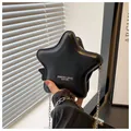 Star-shaped black leather shoulder bag with silver chain strap and fashion logo - Black