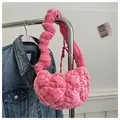 Chic pink plush crossbody bag with textured bubble ruffles and a soft shoulder strap - Pink