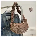 Brown plush shoulder bag featuring a stylish pleated ruched design and soft furry texture - Coffee