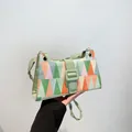 Moderne geometrische Patchwork-Handtasche in Grün und Orange mit elegantem Lederriemen - Grün