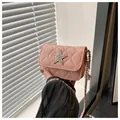 Pink quilted mini crossbody bag with diamond star buckle and chain shoulder strap - Pink