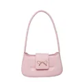 Pink faux leather shoulder bag with gold metal bow buckle on clean white background - Pink